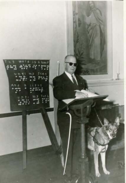 Picture of Founder John Erickson and Guide Dog